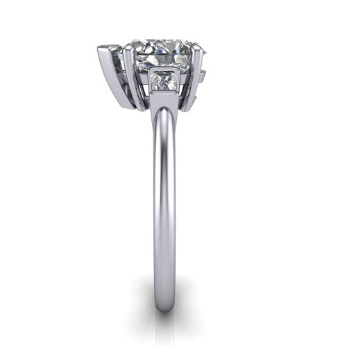 Jade pear three stone engagement ring in 18K White Gold with tapered baguette side stones, side profile showing the plain band and bar-set baguette