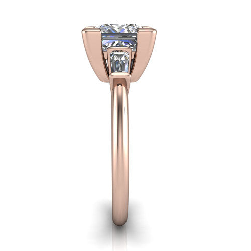 Jade princess three stone engagement ring in 18K Rose Gold with tapered baguette side stones, side profile showing the plain band and bar-set baguette