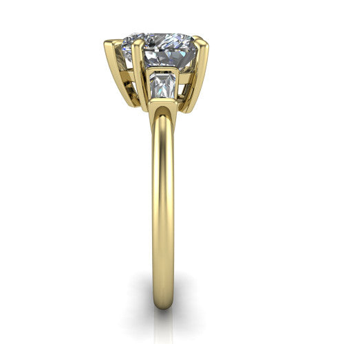 Jade heart three stone engagement ring in 14K Yellow Gold with tapered baguette side stones, side profile showing the plain band and bar-set baguette