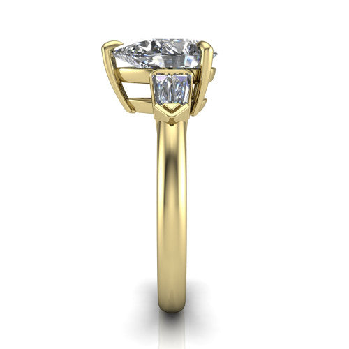 Gracie pear three stone engagement ring in 14K Yellow Gold, side profile showing the baguette side stones and polished band
