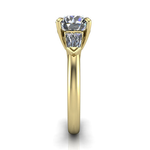 Gracie round three stone engagement ring in 18K Yellow Gold, side profile showing the baguette side stones and polished band
