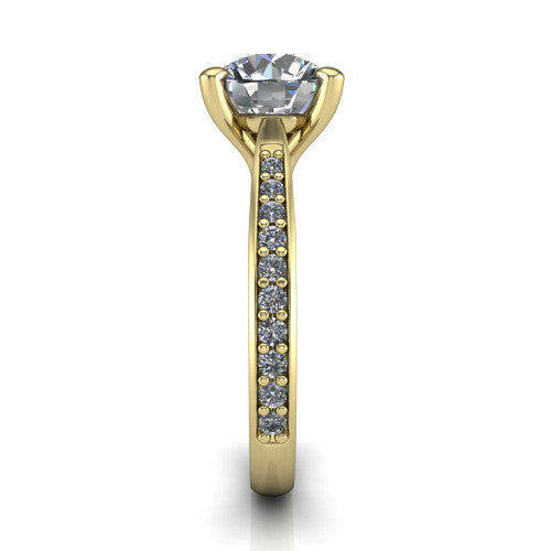 Ruby round classic engagement ring in 18K Yellow Gold, side profile showing the cathedral shoulders and the round diamonds running down the shank