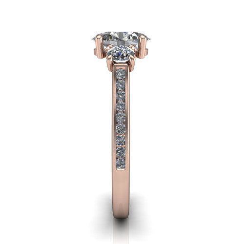 Saoirse oval three stone engagement ring in 18K Rose Gold, side profile showing the round side stone and the pavé diamonds running down the shank
