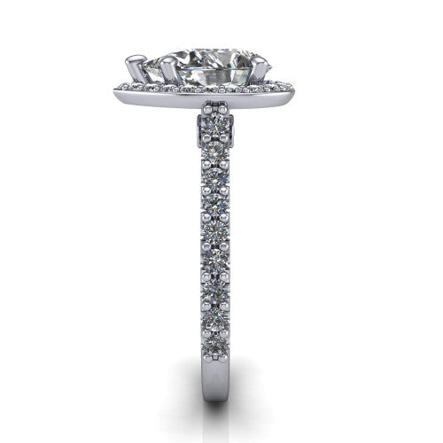 Rowan pear halo engagement ring in Platinum, side profile showing the pavé diamonds running down the shank and the hidden gallery accent
