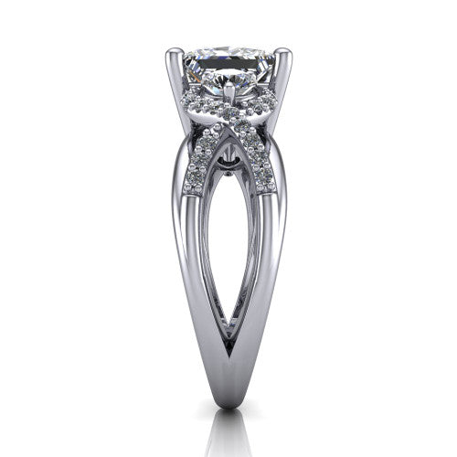Amara princess three stone engagement ring in Platinum, side profile showing the pavé rails crossing in an infinity twist beneath the head