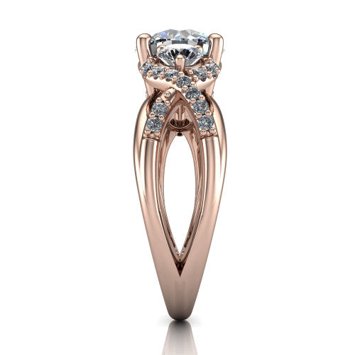 Amara round three stone engagement ring in 18K Rose Gold, side profile showing the pavé rails crossing in an infinity twist beneath the head