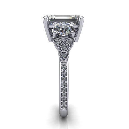 Zion emerald three stone engagement ring in 14K White Gold, side profile showing the trinity-knot shoulder and the pavé diamonds running down the shank