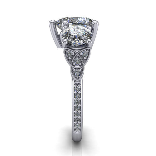 Zion heart three stone engagement ring in 14K White Gold, side profile showing the trinity-knot shoulder and the pavé diamonds running down the shank