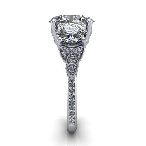Zion oval three stone engagement ring in 14K White Gold, side profile showing the trinity-knot shoulder and the pavé diamonds running down the shank