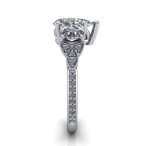 Zion pear three stone engagement ring in 14K White Gold, side profile showing the trinity-knot shoulder and the pavé diamonds running down the shank