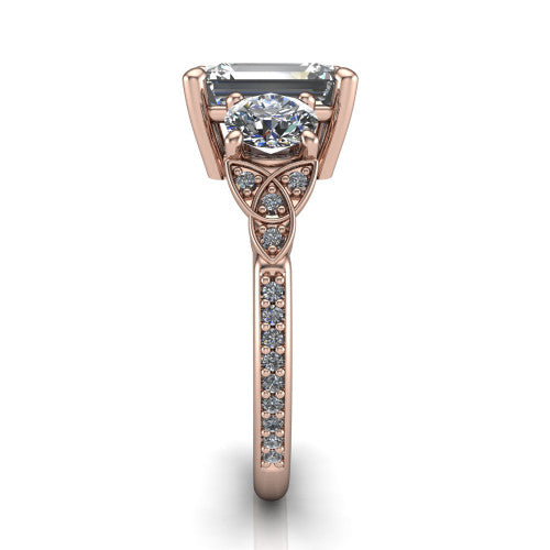 Zion emerald three stone engagement ring in 18K Rose Gold, side profile showing the trinity-knot shoulder and the pavé diamonds running down the shank