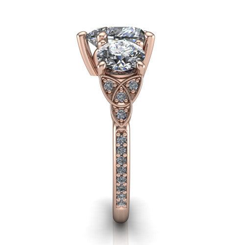 Zion heart three stone engagement ring in 14K Rose Gold, side profile showing the trinity-knot shoulder and the pavé diamonds running down the shank