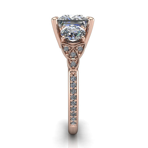 Zion princess three stone engagement ring in 14K Rose Gold, side profile showing the trinity-knot shoulder and the pavé diamonds running down the shank