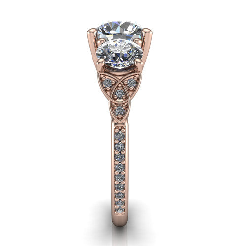 Zion round three stone engagement ring in 18K Rose Gold, side profile showing the trinity-knot shoulder and the pavé diamonds running down the shank