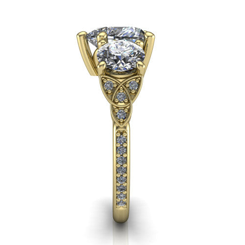 Zion heart three stone engagement ring in 18K Yellow Gold, side profile showing the trinity-knot shoulder and the pavé diamonds running down the shank