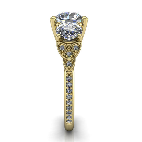 Zion round three stone engagement ring in 18K Yellow Gold, side profile showing the trinity-knot shoulder and the pavé diamonds running down the shank