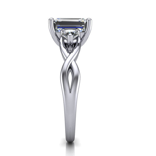 Alina emerald three stone engagement ring in 14K White Gold, side profile showing the twisted infinity vine band sweeping to the emerald center
