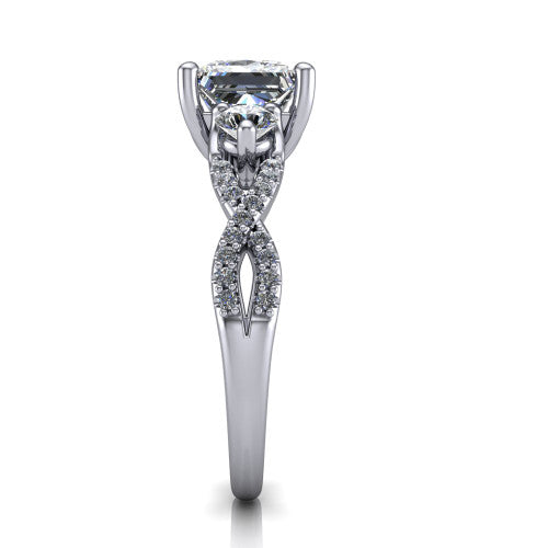 Ryleigh princess three stone engagement ring in Platinum, side profile showing the twisted pavé infinity band sweeping to the princess center
