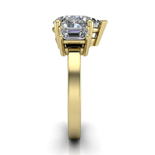 Madelyn pear three stone engagement ring in 14K Yellow Gold with emerald-cut side stones, side profile showing the plain band and step-cut side stones