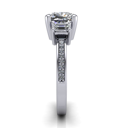 Freya cushion three stone engagement ring in Platinum, side profile showing the pavé milgrain band and the three-stone setting in profile