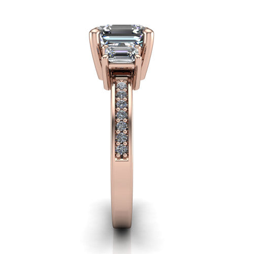 Freya square emerald three stone engagement ring in 14K Rose Gold, side profile showing the pavé milgrain band and the three-stone setting in profile