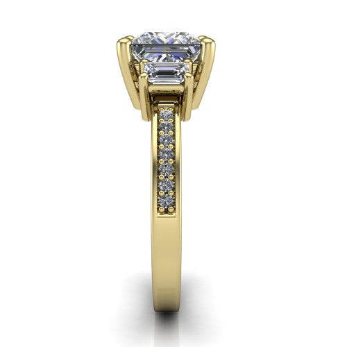 Freya princess three stone engagement ring in 18K Yellow Gold, side profile showing the pavé milgrain band and the three-stone setting in profile