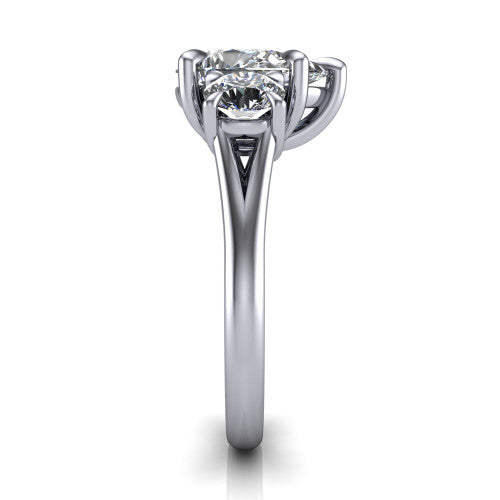 Jasmine pear three stone engagement ring in Platinum with round side stones, side profile showing the plain band and split under-gallery