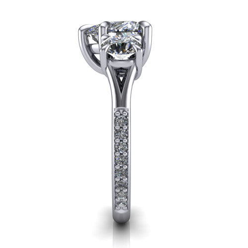 Ruth heart three stone engagement ring in 18K White Gold, side profile showing the pavé band and the three-stone setting in profile