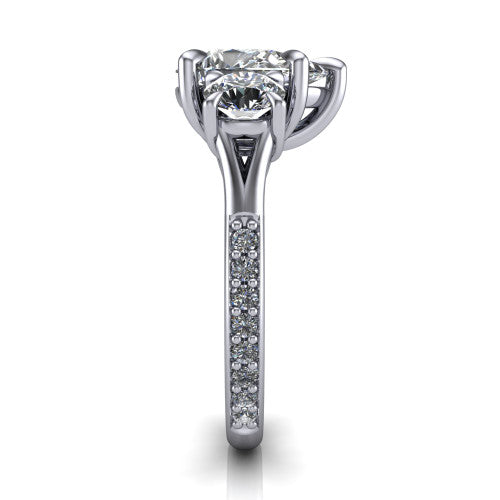 Ruth pear three stone engagement ring in 14K White Gold, side profile showing the pavé band and the three-stone setting in profile