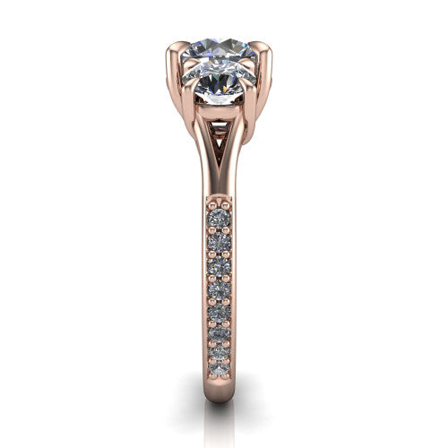 Ruth round three stone engagement ring in 14K Rose Gold, side profile showing the pavé band and the three-stone setting in profile