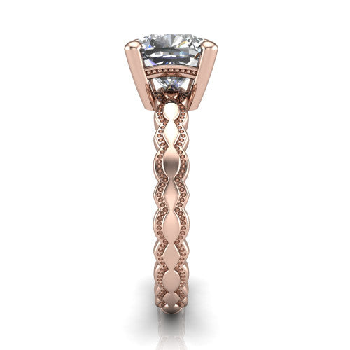 Flora cushion solitaire engagement ring in 18K Rose Gold, side profile showing the scalloped milgrain band and the open basket beneath the cushion center