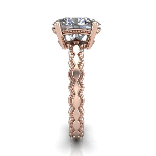 Flora oval solitaire engagement ring in 14K Rose Gold, side profile showing the scalloped milgrain band and the open basket beneath the oval center
