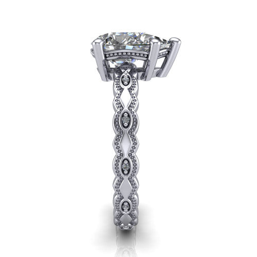 Ivy pear solitaire engagement ring in 18K White Gold, side profile showing the milgrain marquise shapes and bezel-set round accents around the shank
