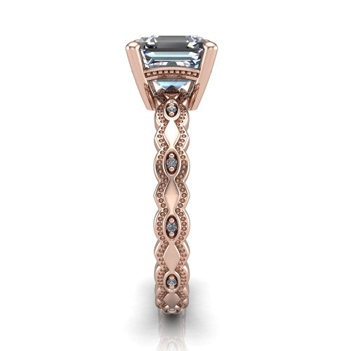 Ivy asscher solitaire engagement ring in 14K Rose Gold, side profile showing the milgrain marquise shapes and bezel-set round accents around the shank