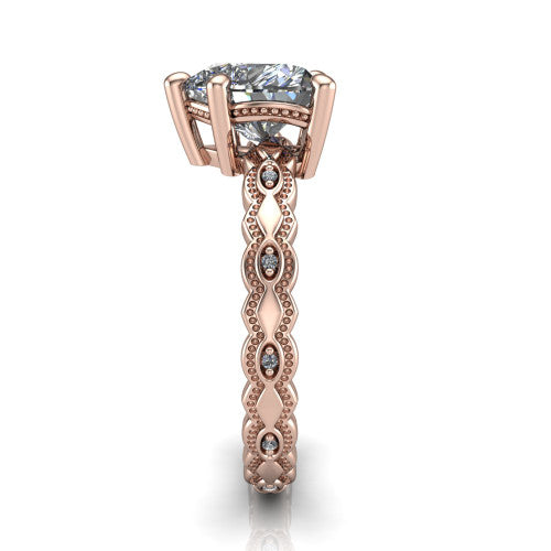 Ivy heart solitaire engagement ring in 14K Rose Gold, side profile showing the milgrain marquise shapes and bezel-set round accents around the shank