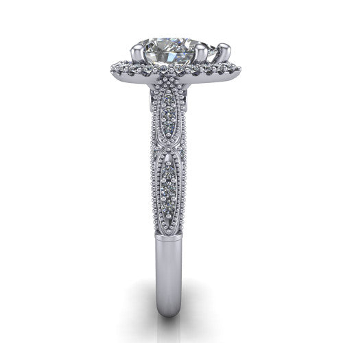 Jenna pear vintage halo engagement ring in Platinum, side profile showing the pavé milgrain band, bezel side accent, and squared halo in profile