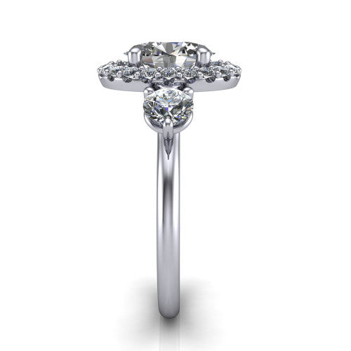 Carol oval three stone halo engagement ring in 14K White Gold, side profile showing the plain polished band and the three-stone halo head in profile