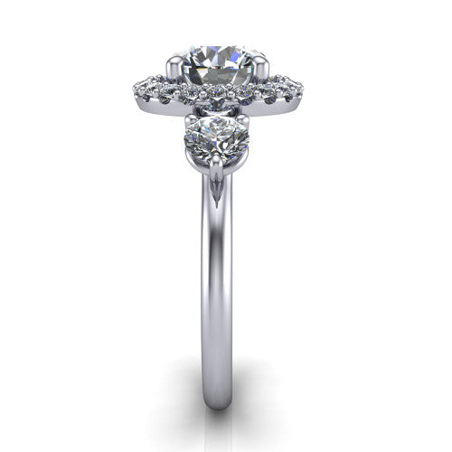 Carol round three stone halo engagement ring in 14K White Gold, side profile showing the plain polished band and the three-stone halo head in profile