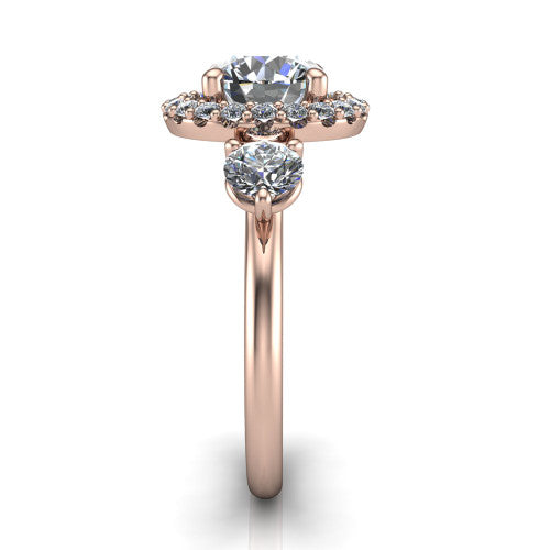 Carol round three stone halo engagement ring in 14K Rose Gold, side profile showing the plain polished band and the three-stone halo head in profile
