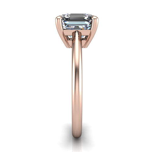 Avery square emerald classic solitaire engagement ring in 14K Rose Gold, side profile showing the smooth polished band and the open basket beneath the square emerald center