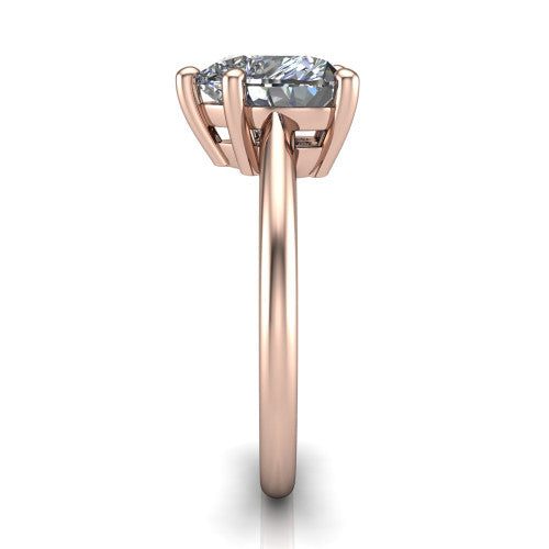 Avery heart classic solitaire engagement ring in 18K Rose Gold, side profile showing the smooth polished band and the open basket beneath the heart center