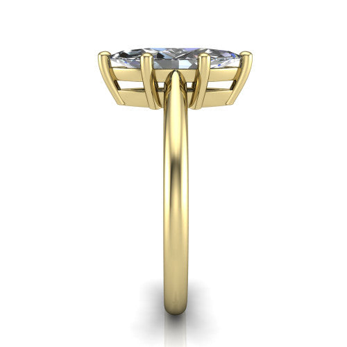 Avery marquise classic solitaire engagement ring in 14K Yellow Gold, side profile showing the smooth polished band and the open basket beneath the marquise center