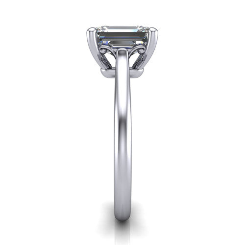 Margaret emerald classic solitaire engagement ring in Platinum, side profile showing the plain polished band and the openwork filigree gallery in profile