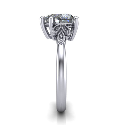 Athena heart vintage solitaire engagement ring in Platinum, side profile showing the fleur-de-lis filigree accents, milgrain detail, and plain band in profile