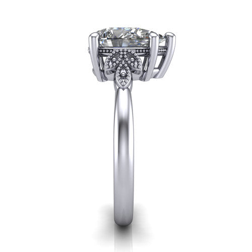 Athena pear vintage solitaire engagement ring in 14K White Gold, side profile showing the fleur-de-lis filigree accents, milgrain detail, and plain band in profile