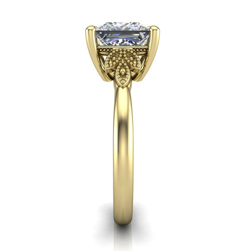 Athena princess vintage solitaire engagement ring in 14K Yellow Gold, side profile showing the fleur-de-lis filigree accents, milgrain detail, and plain band in profile
