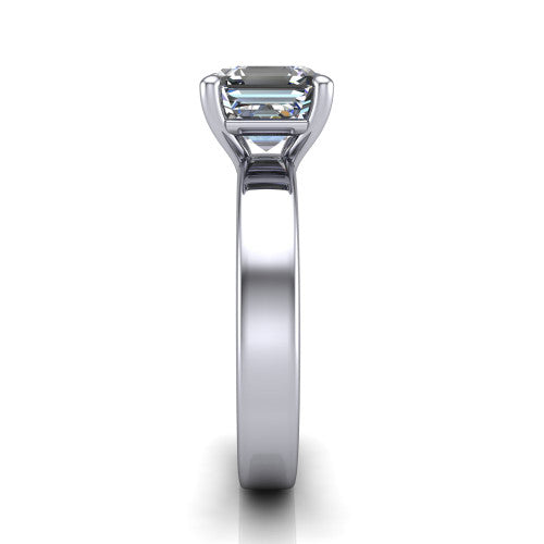 Louise square emerald classic solitaire engagement ring in 18K White Gold, side profile showing the substantial flat polished band and the open basket beneath the square emerald center
