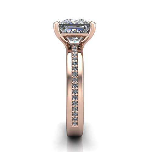 Kamala princess classic solitaire engagement ring in 18K Rose Gold, side profile showing the wide channel-set pavé band with high-polish edges and the open basket