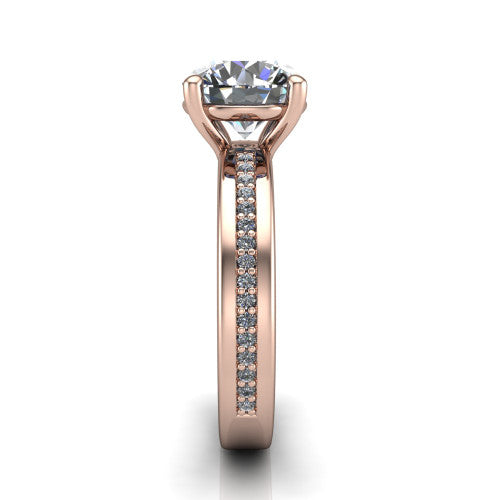 Kamala round classic solitaire engagement ring in 14K Rose Gold, side profile showing the wide channel-set pavé band with high-polish edges and the open basket