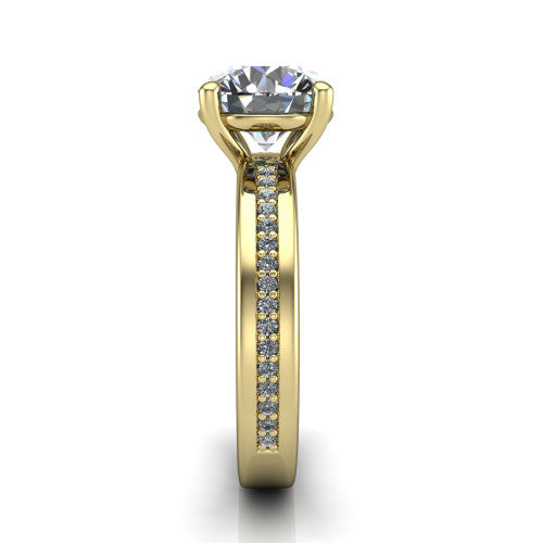 Kamala round classic solitaire engagement ring in 14K Yellow Gold, side profile showing the wide channel-set pavé band with high-polish edges and the open basket